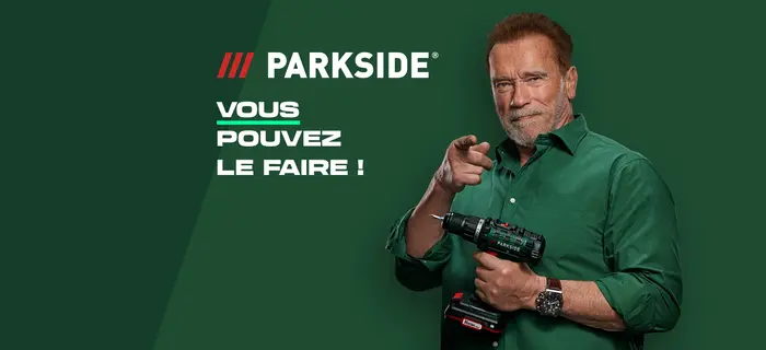 Arnold Schwarzenegger sur un fond vert foncé et rouge faisant la promo de la marque parkside